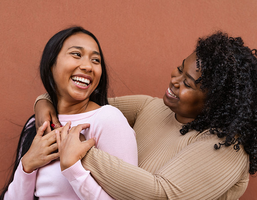 Two women laughing and having fun